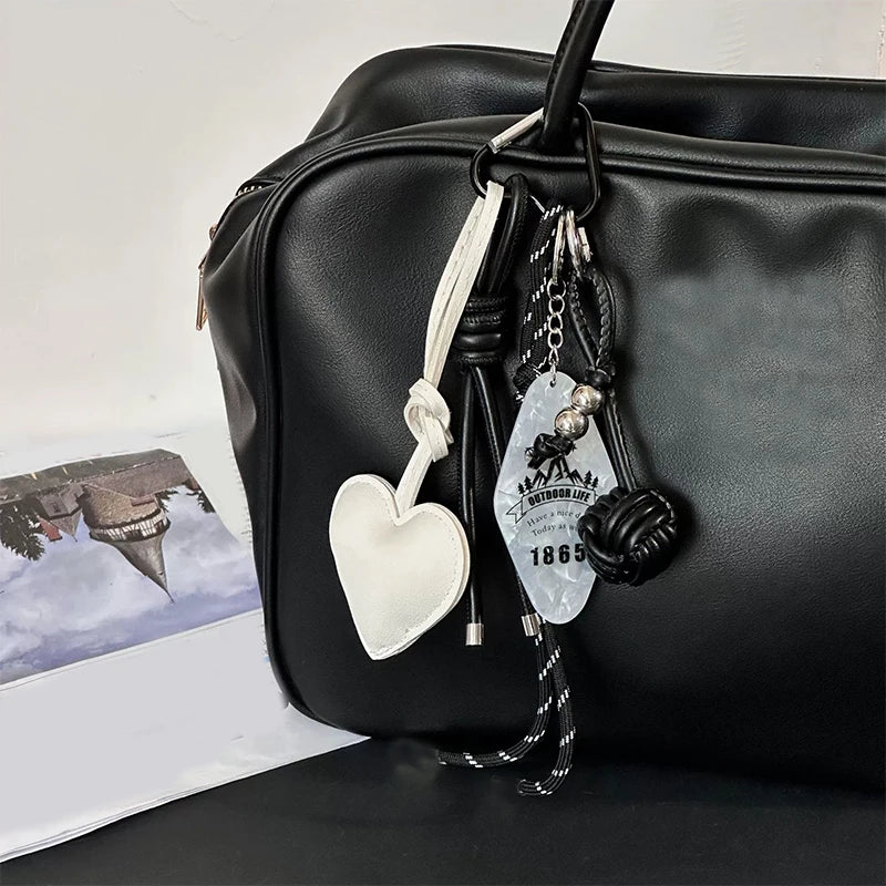 Trendy Leather Heart Bow Keychain